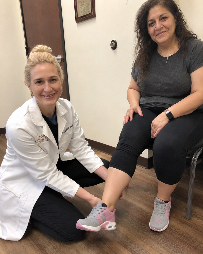 Patient testing Orthera shoes with doctor